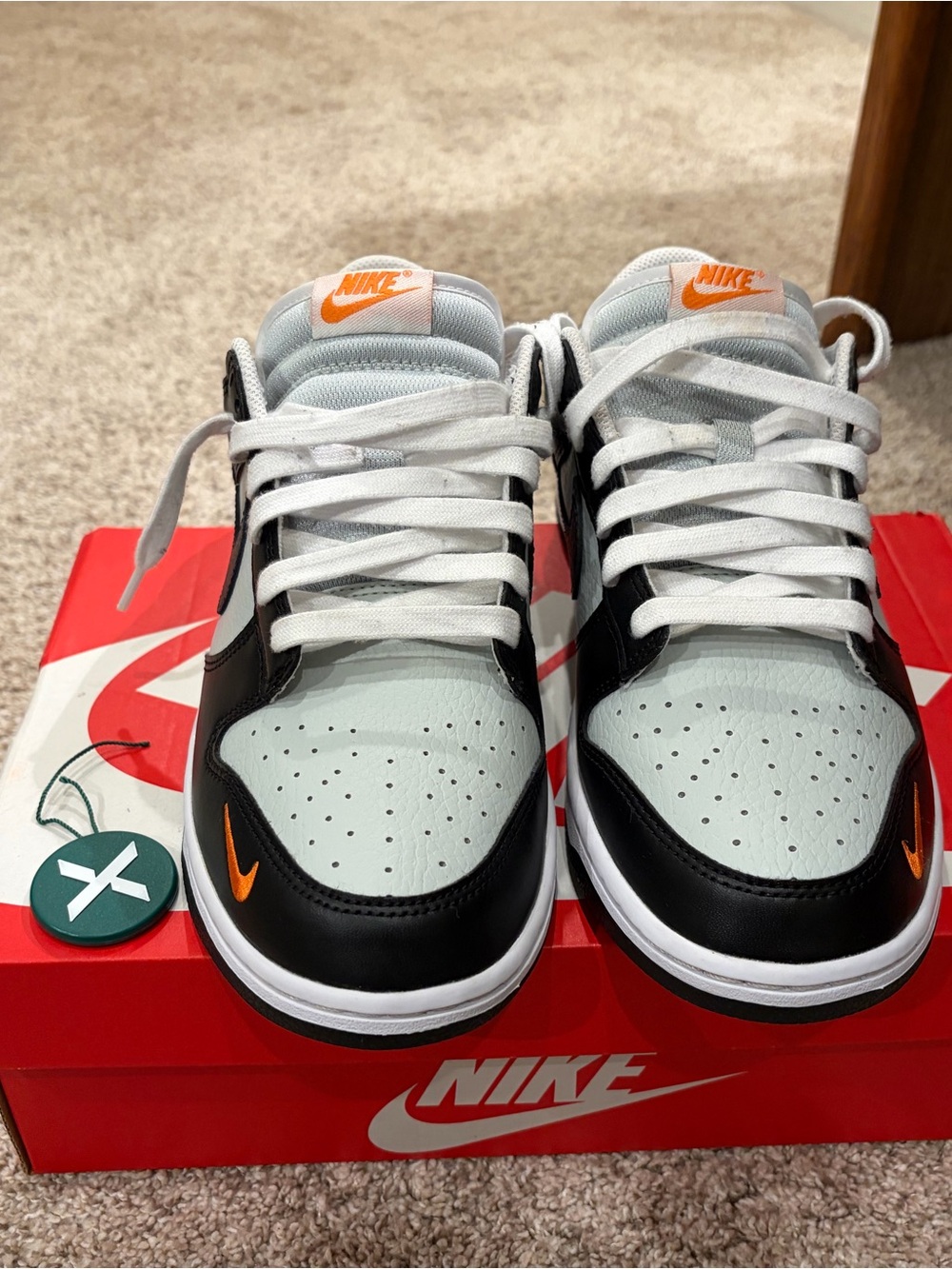 Nike Dunk Low Black Total Orange Mini
Swoosh